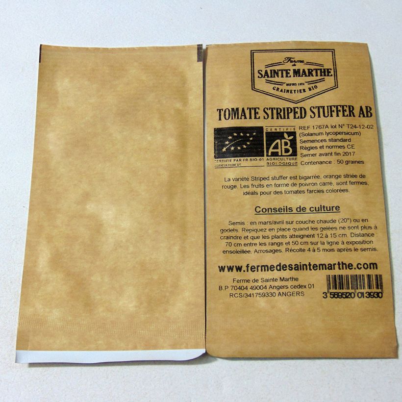 Voorbeeld van een exemplaar van Tomaat Striped Stuffer BIO - Ferme de Sainte Marthe het zakje met 50 zaden zoals geleverd