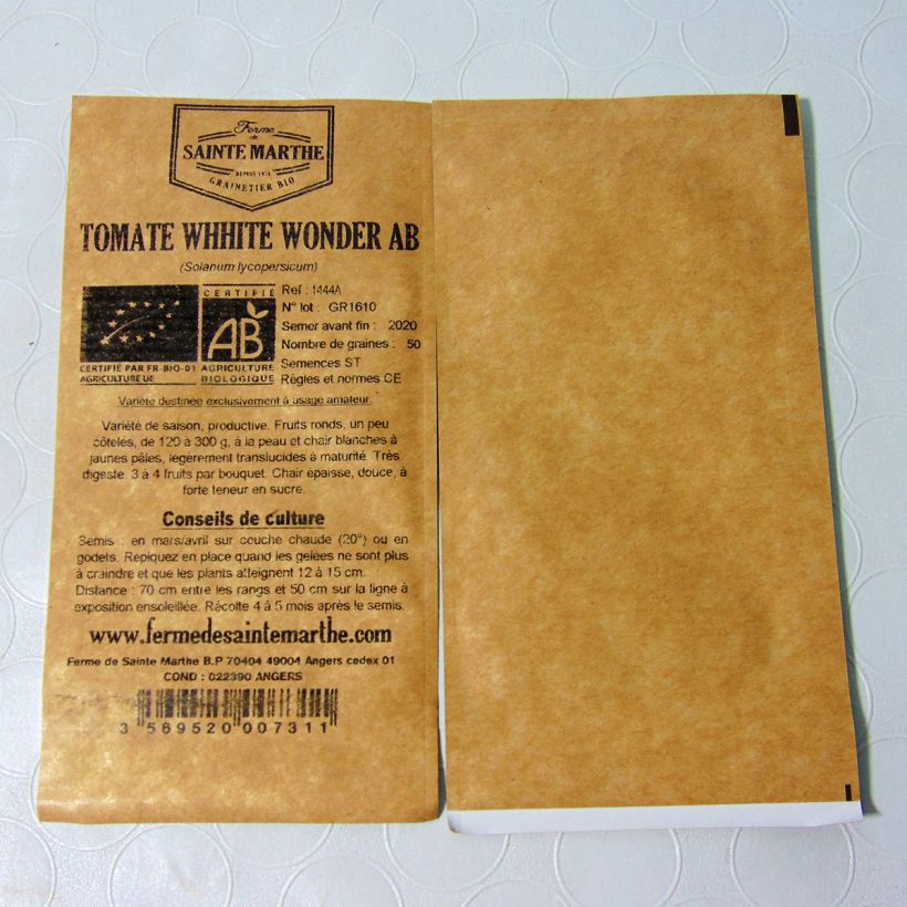 Voorbeeld van een exemplaar van Tomaat White Wonder BIO - Ferme de Sainte Marthe het zakje met 50 zaden zoals geleverd