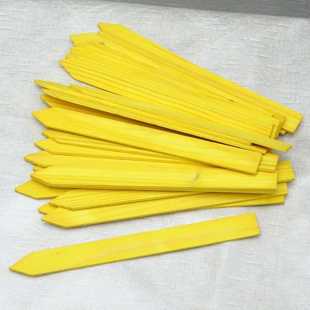 Plantetiket van geel hout